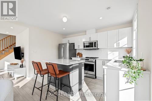 60 - 383 Dundas Street E, Hamilton (Waterdown), ON - Indoor Photo Showing Kitchen With Stainless Steel Kitchen With Upgraded Kitchen