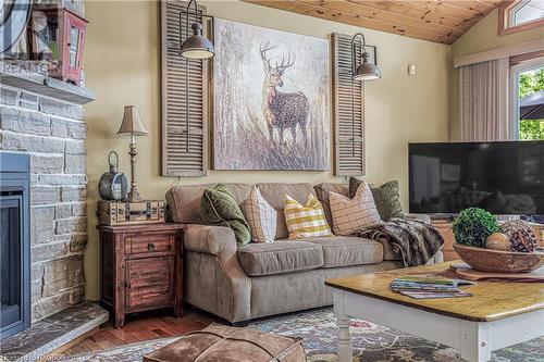 420 Mallory Beach Road, South Bruce Peninsula, ON - Indoor Photo Showing Living Room With Fireplace