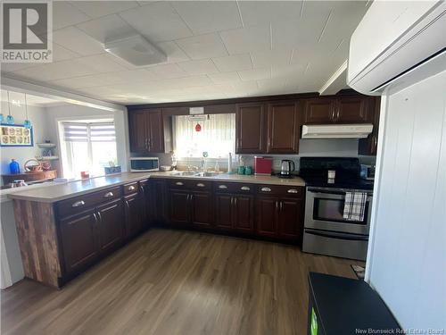 39 Normandie E, Petit-Rocher, NB - Indoor Photo Showing Kitchen With Double Sink