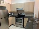 Uph 3 - 105 Victoria Street, Toronto, ON  - Indoor Photo Showing Kitchen With Double Sink 