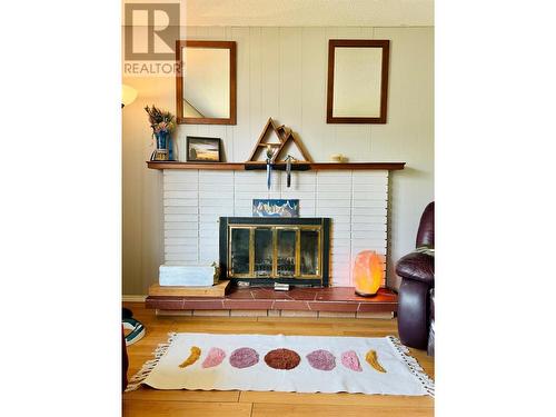 1300 2A  S Avenue, Cranbrook, BC - Indoor Photo Showing Living Room With Fireplace