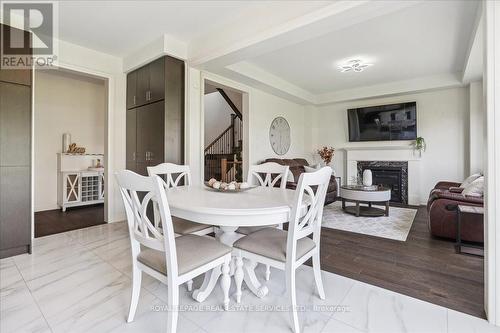 81 Granite Ridge Trail, Hamilton (Waterdown), ON - Indoor Photo Showing Dining Room With Fireplace