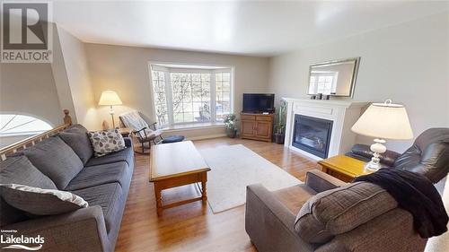 357 Ravenscliffe Road, Huntsville, ON - Indoor Photo Showing Living Room With Fireplace