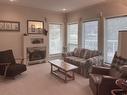 101-45 Hudsons Bay Trail, Kamloops, BC  - Indoor Photo Showing Living Room With Fireplace 