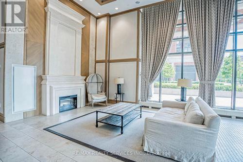 1006 - 3091 Dufferin Street, Toronto (Yorkdale-Glen Park), ON - Indoor Photo Showing Living Room With Fireplace