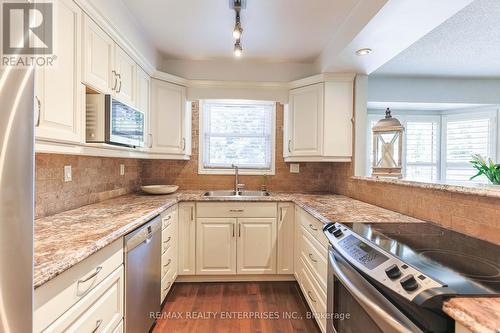 2 - 230 Meadowbrook Drive W, Hamilton (Ancaster), ON - Indoor Photo Showing Kitchen With Double Sink