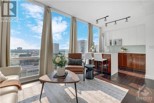 Spectacular site lines for the sunsets - 201 Parkdale Avenue Unit#1204, Ottawa, ON - Indoor Photo Showing Living Room