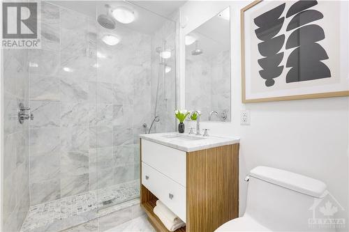 Luxe bath with beautiful marble and glass shower enclosure - 201 Parkdale Avenue Unit#1204, Ottawa, ON - Indoor Photo Showing Bathroom