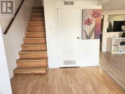 Entrance with coat closet and furnace room - 