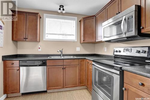 51 5004 James Hill Road, Regina, SK - Indoor Photo Showing Kitchen With Stainless Steel Kitchen With Double Sink