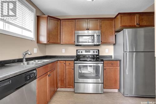 51 5004 James Hill Road, Regina, SK - Indoor Photo Showing Kitchen With Stainless Steel Kitchen With Double Sink