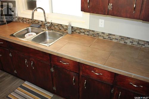 522 Upland Drive, Regina, SK - Indoor Photo Showing Kitchen With Double Sink