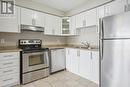 10 - 90 Sovereign'S Gate, Barrie (Innis-Shore), ON  - Indoor Photo Showing Kitchen With Stainless Steel Kitchen With Double Sink 