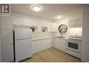 150 Skaha Place Unit# 402, Penticton, BC  - Indoor Photo Showing Kitchen With Double Sink 