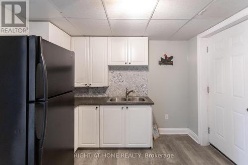 4 Champlain Boulevard, Kawartha Lakes (Lindsay), ON - Indoor Photo Showing Kitchen With Double Sink