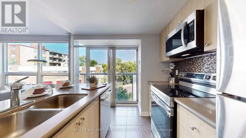 302 - 280 Donlands Avenue, Toronto (Danforth Village-East York), ON - Indoor Photo Showing Kitchen With Double Sink