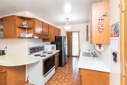 14 Calvert Avenue, Hamilton, ON - Indoor Photo Showing Kitchen With Double Sink