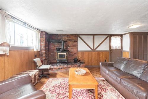 14 Calvert Avenue, Hamilton, ON - Indoor Photo Showing Living Room With Fireplace