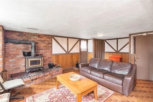 14 Calvert Avenue, Hamilton, ON - Indoor Photo Showing Living Room With Fireplace