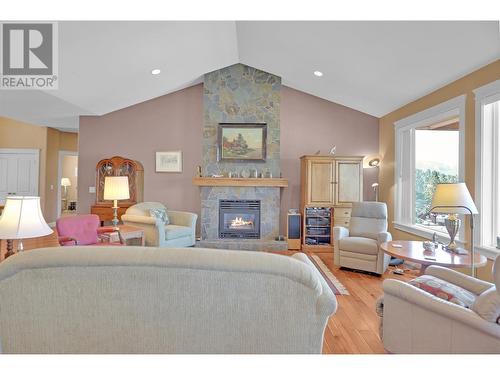 1625 Merlot Drive, West Kelowna, BC - Indoor Photo Showing Living Room With Fireplace