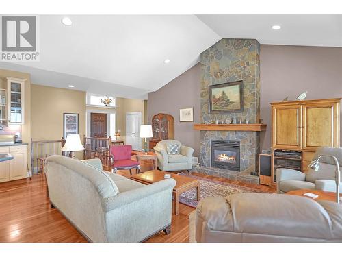 1625 Merlot Drive, West Kelowna, BC - Indoor Photo Showing Living Room With Fireplace