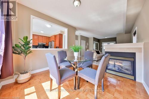 225 Andrews Trail, Milton (Clarke), ON - Indoor Photo Showing Dining Room With Fireplace