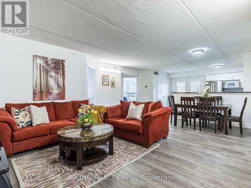 310 - 1350 Main Street E, Milton (Dempsey), ON - Indoor Photo Showing Living Room