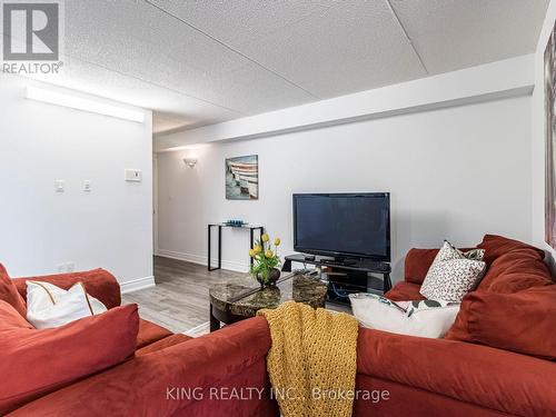 310 - 1350 Main Street E, Milton (Dempsey), ON - Indoor Photo Showing Living Room