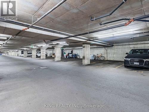 310 - 1350 Main Street E, Milton (Dempsey), ON - Indoor Photo Showing Garage