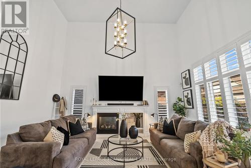 27 Belsey Lane, Clarington (Newcastle), ON - Indoor Photo Showing Living Room With Fireplace