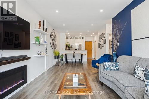 608 - 44 Bond Street W, Oshawa (O'Neill), ON - Indoor Photo Showing Living Room With Fireplace