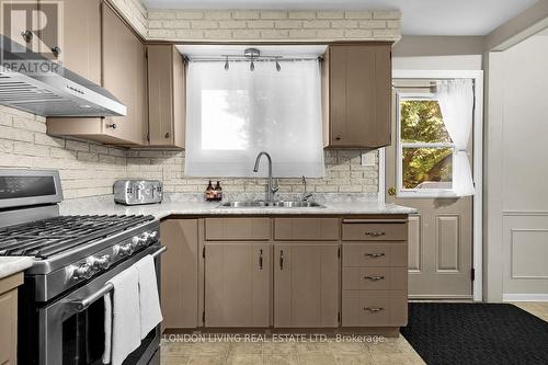 14 Conway Court, Zorra (Thamesford), ON - Indoor Photo Showing Kitchen With Double Sink