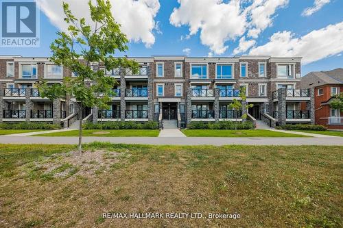 111 - 2 Dunsheath Way, Markham (Cornell), ON - Outdoor With Facade