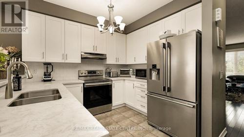 23 - 23 Bakewell Street N, Brampton (Bram West), ON - Indoor Photo Showing Kitchen With Stainless Steel Kitchen With Double Sink With Upgraded Kitchen