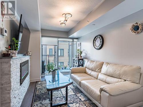 A308 - 1117 Cooke Boulevard, Burlington (Lasalle), ON - Indoor Photo Showing Living Room With Fireplace