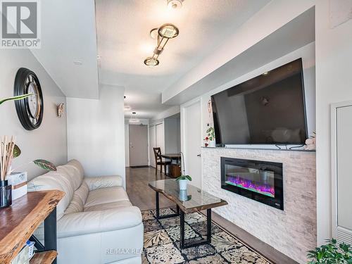 A308 - 1117 Cooke Boulevard, Burlington (Lasalle), ON - Indoor Photo Showing Living Room With Fireplace