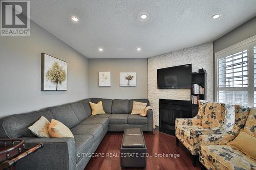 4541 Full Moon Circle, Mississauga (Hurontario), ON - Indoor Photo Showing Living Room With Fireplace