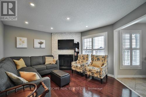 4541 Full Moon Circle, Mississauga (Hurontario), ON - Indoor Photo Showing Living Room With Fireplace