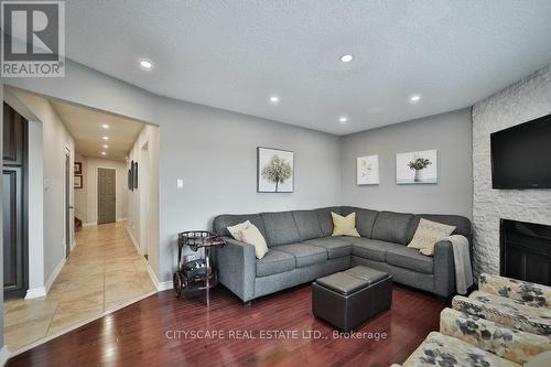 4541 Full Moon Circle, Mississauga (Hurontario), ON - Indoor Photo Showing Living Room With Fireplace