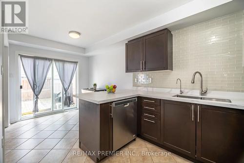 20 - 8 Bradley Avenue N, Hamilton (Binbrook), ON - Indoor Photo Showing Kitchen With Double Sink