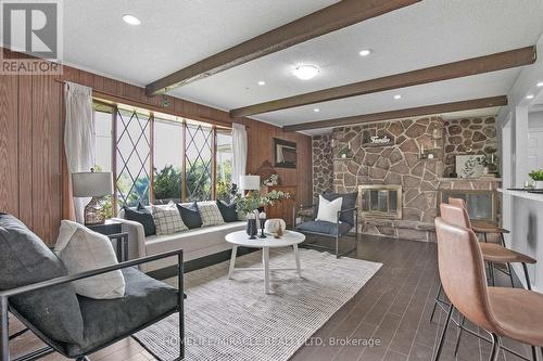 18 Grandy Road, Kawartha Lakes, ON - Indoor Photo Showing Living Room With Fireplace