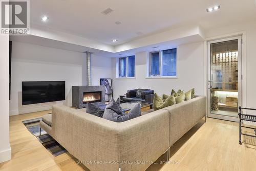 22 Mitchell Avenue, Toronto (Niagara), ON - Indoor Photo Showing Living Room With Fireplace