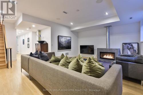 22 Mitchell Avenue, Toronto (Niagara), ON - Indoor Photo Showing Living Room With Fireplace