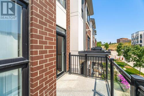 210 - 100 Canon Jackson Drive, Toronto (Brookhaven-Amesbury), ON - Outdoor With Balcony With Exterior