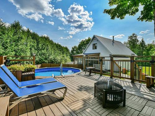 Balcon - 585 Rue De Ronchamp, Sainte-Adèle, QC - Outdoor With Above Ground Pool With Deck Patio Veranda