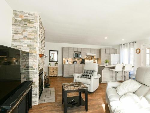 Salon - 585 Rue De Ronchamp, Sainte-Adèle, QC - Indoor Photo Showing Living Room With Fireplace