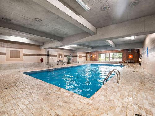 Piscine - 1002-750 Boul. Montpellier, Montréal (Saint-Laurent), QC - Indoor Photo Showing Other Room With In Ground Pool