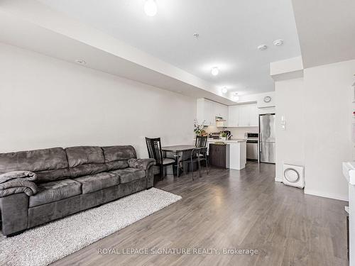 202-1711 Pure Springs Blvd, Pickering, ON - Indoor Photo Showing Living Room