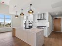 103-2520 Hackett Cres, Central Saanich, BC  - Indoor Photo Showing Kitchen With Double Sink With Upgraded Kitchen 