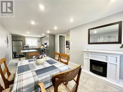 120 King Street, Miramichi, NB - Indoor Photo Showing Dining Room With Fireplace